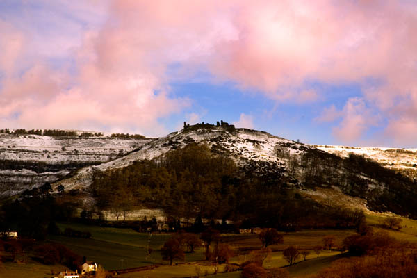 wide shot of castel dinas bran in snow