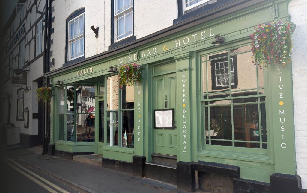 front of gales wine bar building with is striking green walls